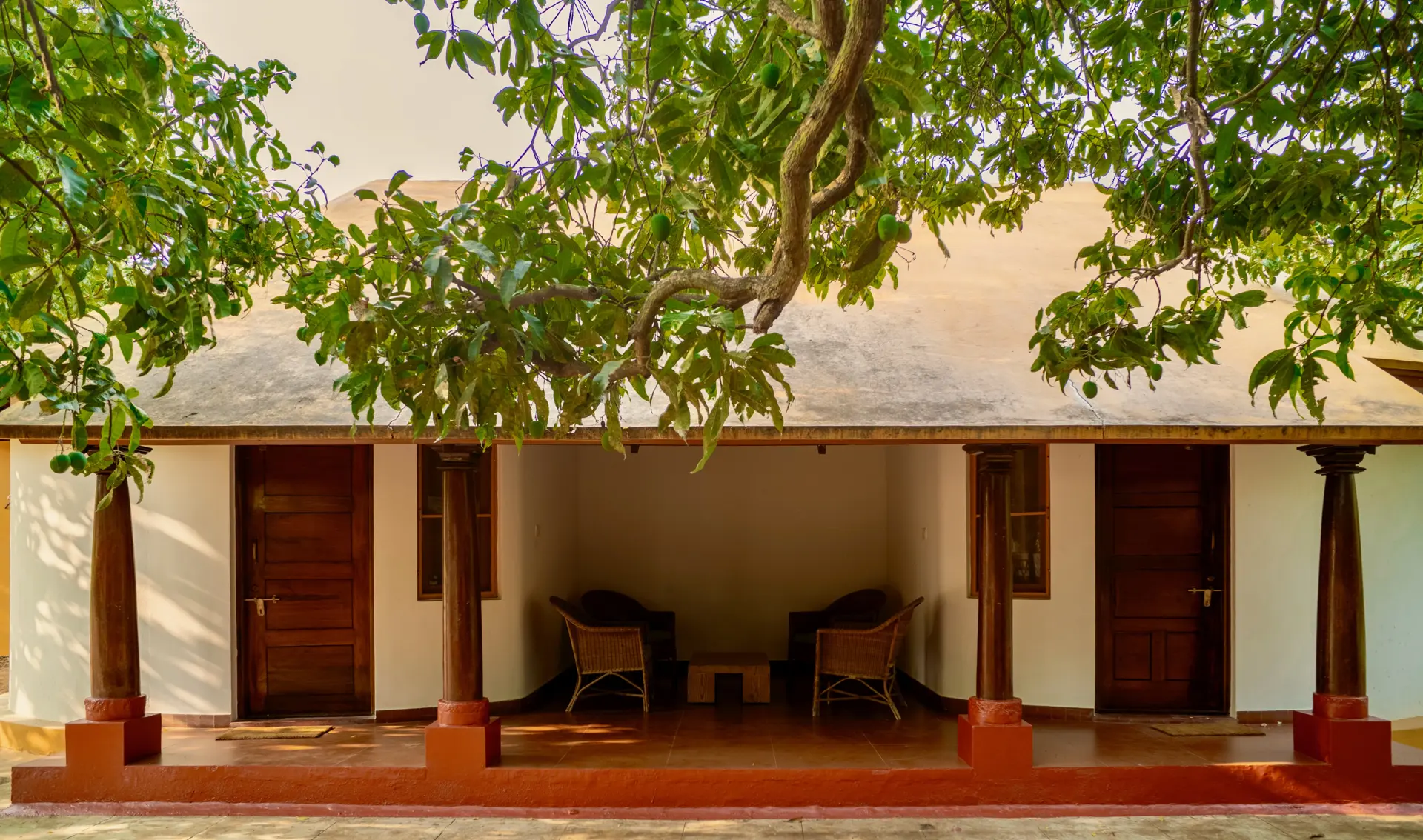 Shruti & Smriti — the twin cottages with their shared veranda